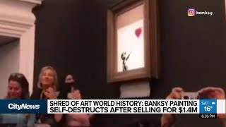 Banksy painting selfdestructs after being sold at auction [upl. by Toblat]